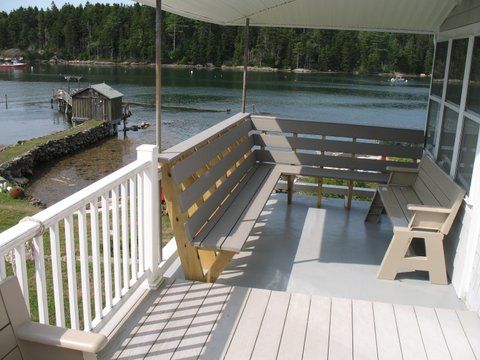 West view from deck, showing benches, fish house & Malaga Island